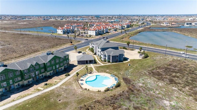aerial view with a residential view and a water view