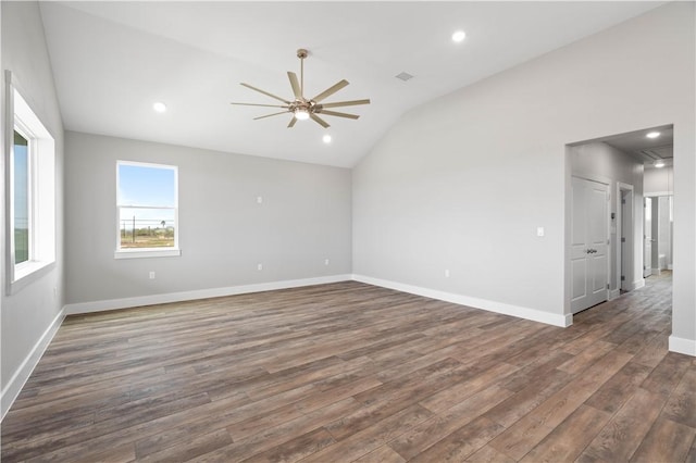 unfurnished room with dark hardwood / wood-style flooring, ceiling fan, and lofted ceiling