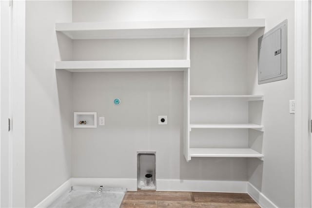 laundry room featuring washer hookup, hookup for a gas dryer, electric dryer hookup, and hardwood / wood-style floors