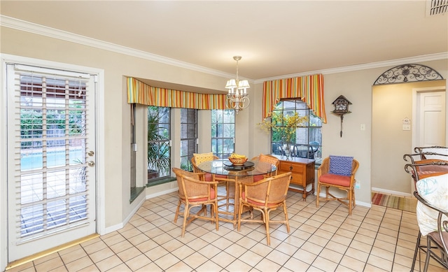 tiled dining room featuring ornamental molding, a wealth of natural light, and an inviting chandelier