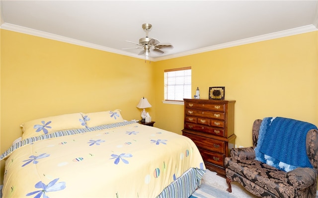 bedroom with ceiling fan and crown molding