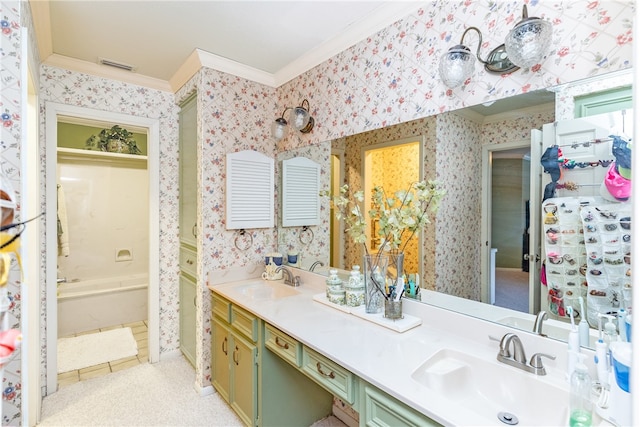 bathroom featuring ornamental molding and vanity