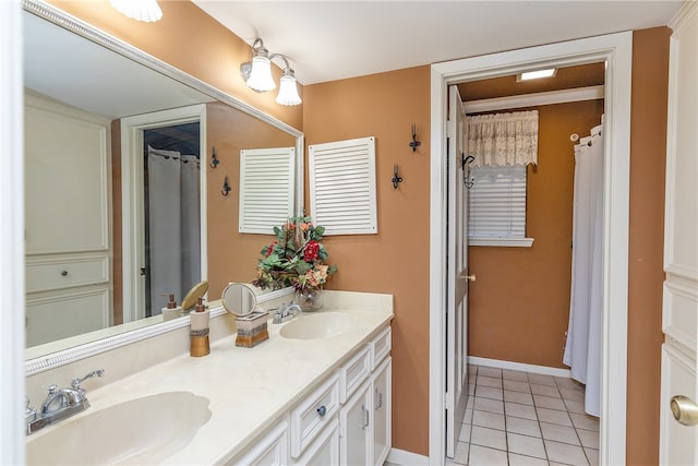 bathroom featuring vanity and tile patterned flooring