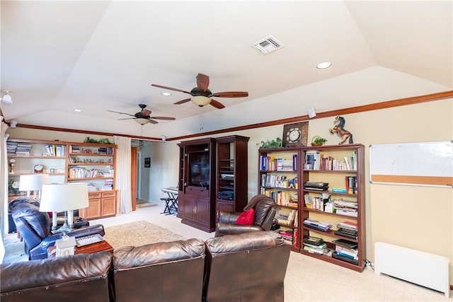 living room featuring lofted ceiling, light colored carpet, and ceiling fan