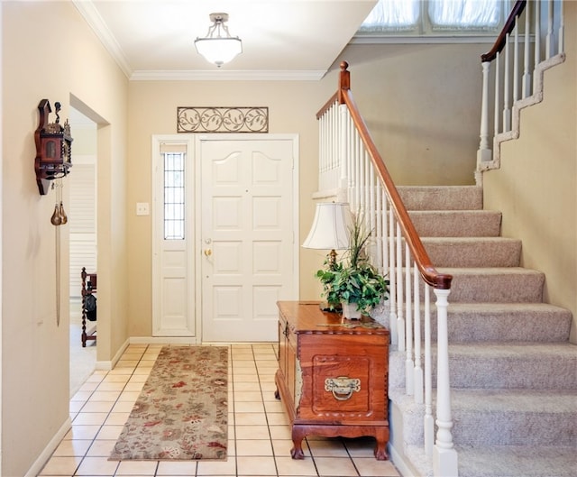 tiled entryway featuring ornamental molding