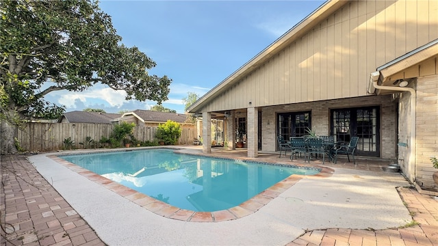 view of pool featuring a patio area