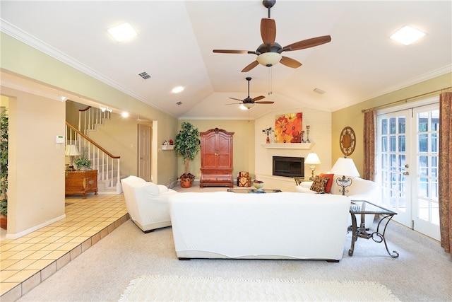 living room featuring ceiling fan, vaulted ceiling, light colored carpet, and ornamental molding