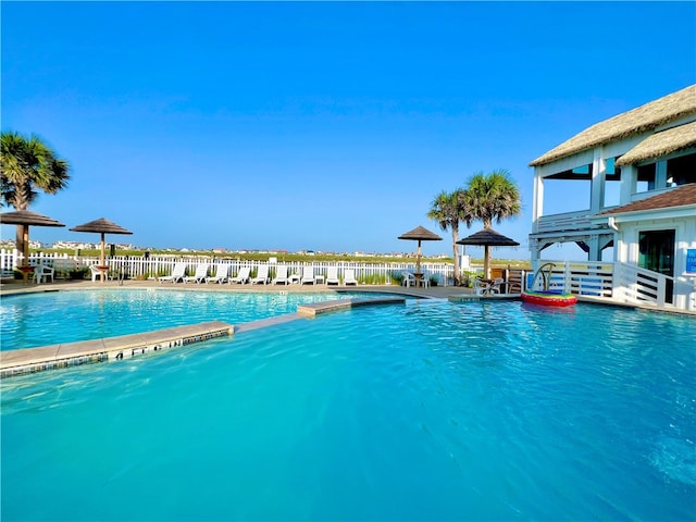 pool featuring fence