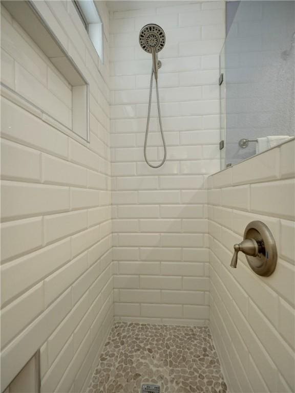 715 Beach Access Road 1a 1204, Port Aransas, TX 78373 - bathroom with a tile shower