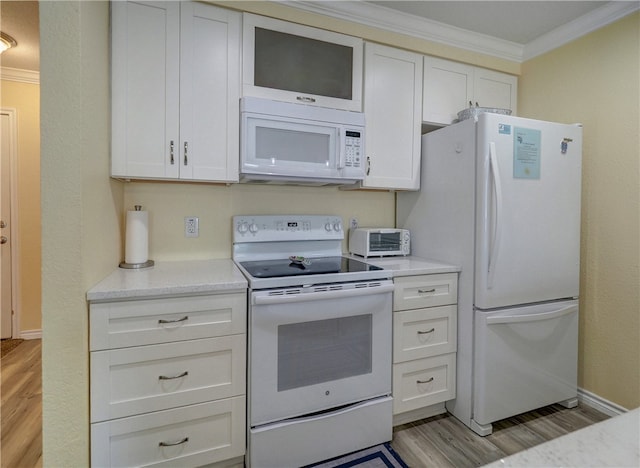 kitchen featuring white cabinetry, light hardwood / wood-style floors, white appliances, and crown molding