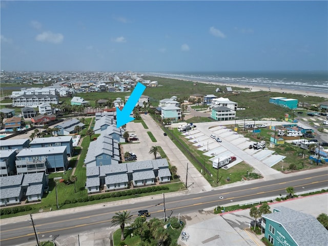 drone / aerial view with a view of the beach and a water view