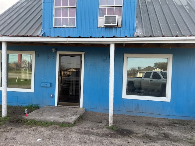 doorway to property with cooling unit