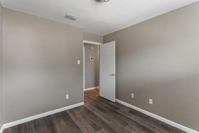 2718 Wind Rock Dr, Corpus Christi, TX 78410 - spare room with wood finished floors and baseboards