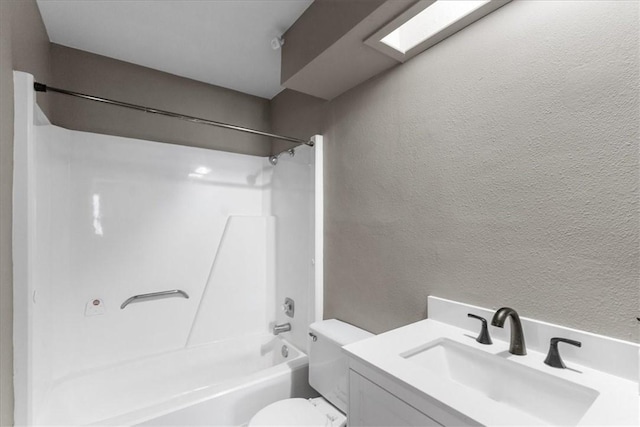 2718 Wind Rock Dr, Corpus Christi, TX 78410 - bathroom featuring a textured wall,  shower combination, toilet, and vanity
