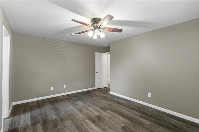 2718 Wind Rock Dr, Corpus Christi, TX 78410 - spare room featuring baseboards, ceiling fan, and dark wood-type flooring