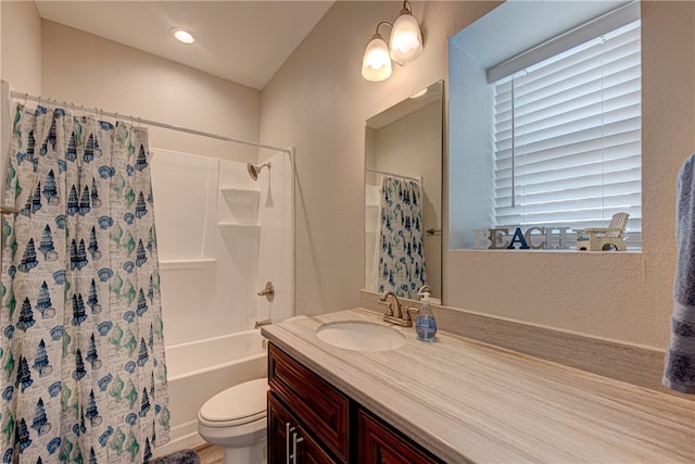 full bathroom featuring vanity, toilet, and shower / bathtub combination with curtain