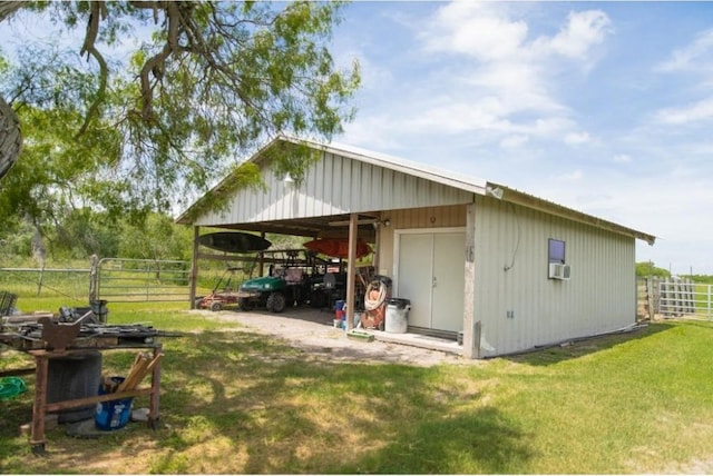 view of outdoor structure with a yard