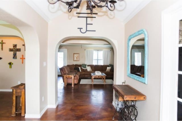 interior space with ornamental molding and dark wood-type flooring