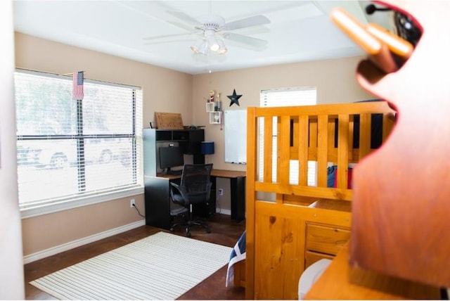 bedroom featuring ceiling fan and dark hardwood / wood-style flooring