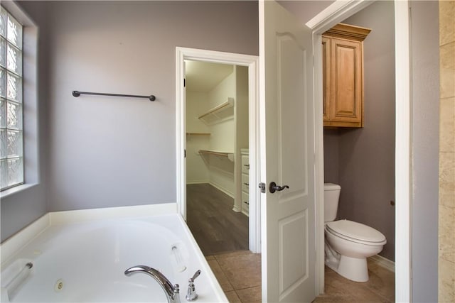 6825 Old Square Dr, Corpus Christi, TX 78414 - bathroom with a jetted tub and plenty of natural light