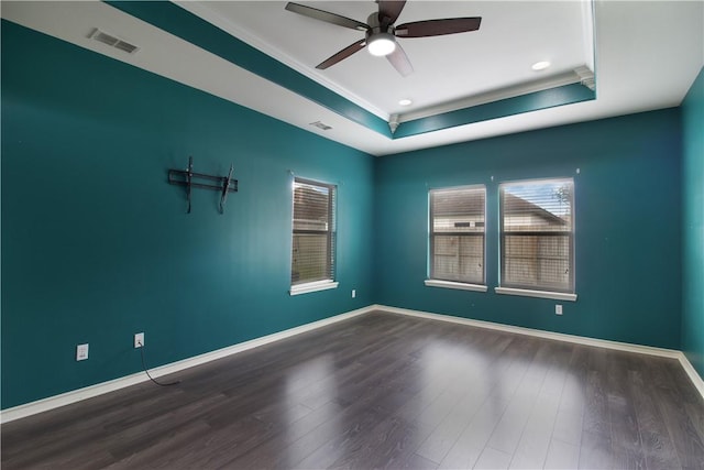 6825 Old Square Dr, Corpus Christi, TX 78414 - unfurnished room with a raised ceiling, ceiling fan, crown molding, plenty of natural light, and wood finished floors
