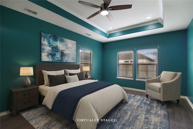 6825 Old Square Dr, Corpus Christi, TX 78414 - bedroom with ornamental molding, a tray ceiling, wood finished floors, multiple windows, and recessed lighting