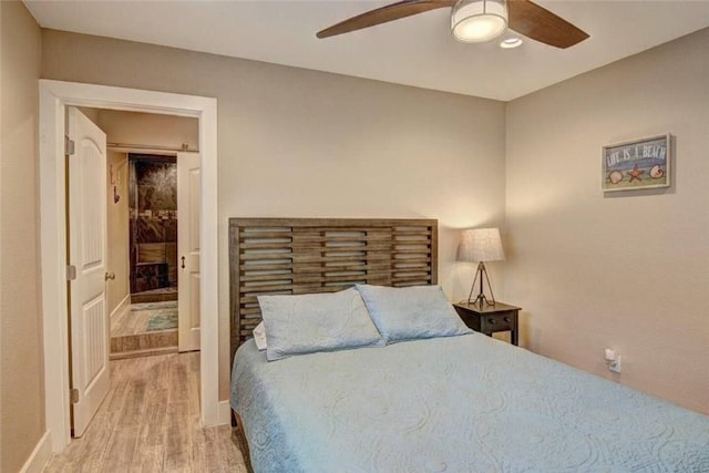 bedroom featuring light hardwood / wood-style floors and ceiling fan