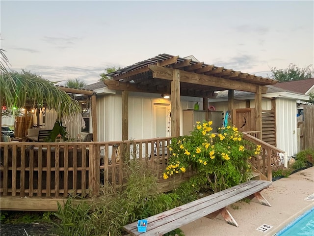 view of home's exterior with a pergola