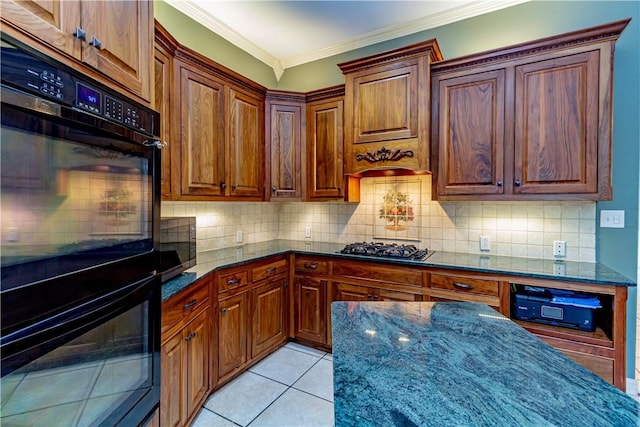 7906 Valtourmanche Dr, Corpus Christi, TX 78414 - kitchen with dark stone counters, ornamental molding, gas cooktop, tasteful backsplash, and light tile patterned flooring