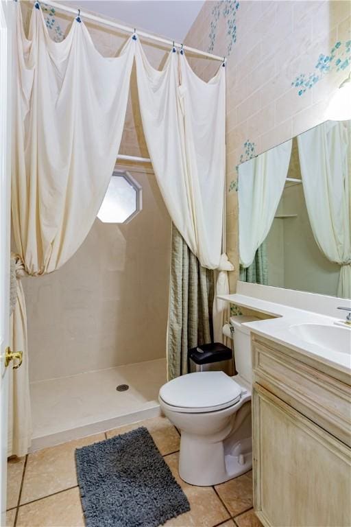7906 Valtourmanche Dr, Corpus Christi, TX 78414 - full bathroom with toilet, vanity, curtained shower, and tile patterned flooring