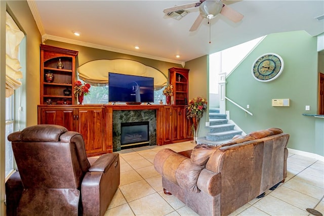 7906 Valtourmanche Dr, Corpus Christi, TX 78414 - living area with light tile patterned floors, a ceiling fan, a high end fireplace, ornamental molding, and stairway