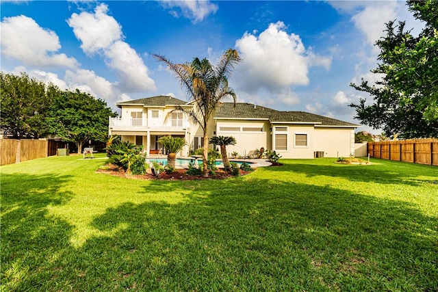 7906 Valtourmanche Dr, Corpus Christi, TX 78414 - back of house featuring stucco siding and a balcony