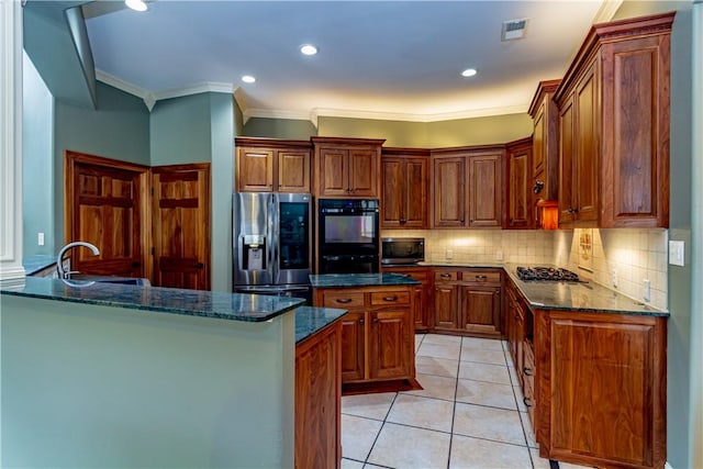 7906 Valtourmanche Dr, Corpus Christi, TX 78414 - kitchen featuring appliances with stainless steel finishes, a sink, backsplash, ornamental molding, and dark stone counters
