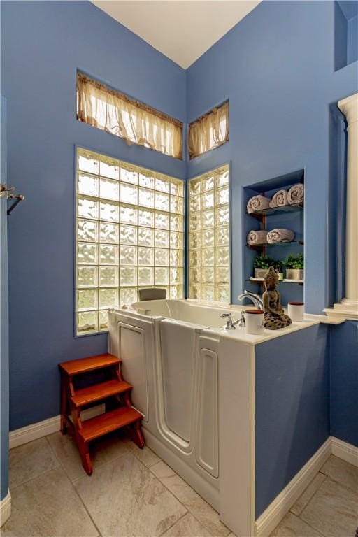 7906 Valtourmanche Dr, Corpus Christi, TX 78414 - full bathroom with a bath and baseboards