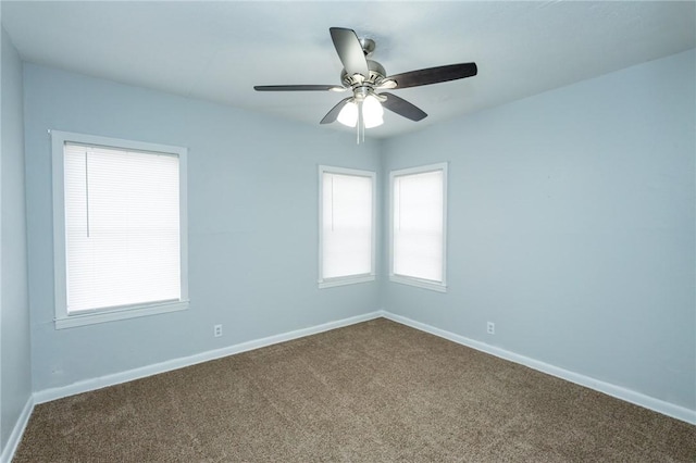 unfurnished room featuring carpet flooring and ceiling fan