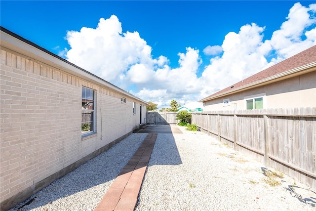 view of property exterior featuring a patio