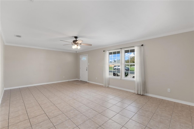 unfurnished room featuring ceiling fan, light tile patterned floors, and ornamental molding