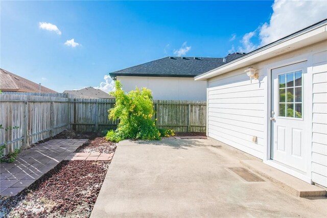 15522 Finistere St, Corpus Christi, TX 78418 - fenced backyard featuring a patio