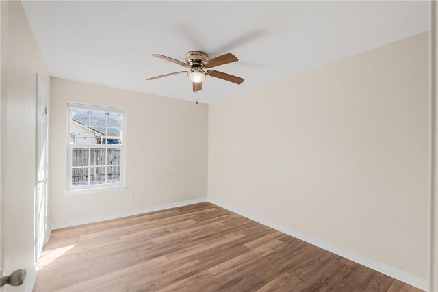 15522 Finistere St, Corpus Christi, TX 78418 - empty room featuring light wood-style floors and ceiling fan