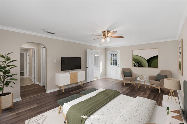 bedroom with dark wood-type flooring, ceiling fan, and crown molding