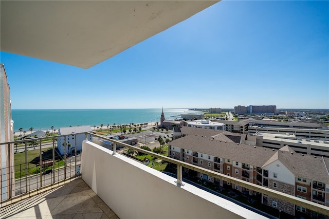 balcony featuring a water view