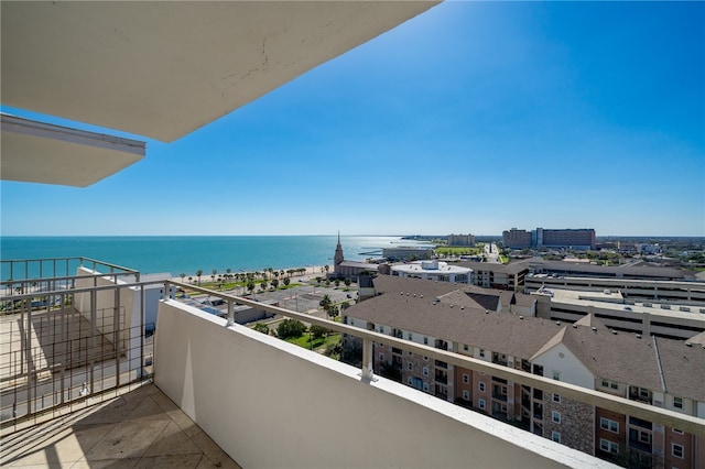 balcony featuring a water view