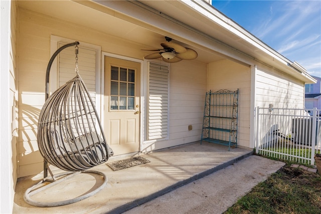 doorway to property featuring ceiling fan