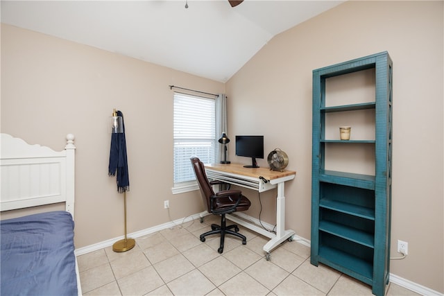 tiled office featuring vaulted ceiling and ceiling fan