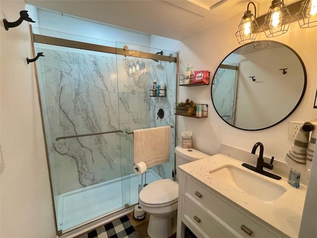 3938 Surfside Blvd Unit 2225, Corpus Christi, TX 78402 - full bathroom featuring toilet, a marble finish shower, and vanity