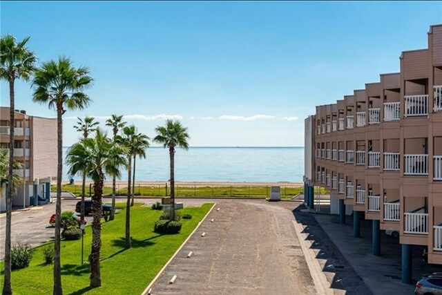 3938 Surfside Blvd Unit 2225, Corpus Christi, TX 78402 - surrounding community featuring a water view and a yard