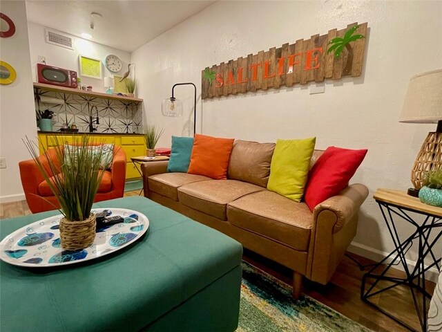 3938 Surfside Blvd Unit 2225, Corpus Christi, TX 78402 - living area with wood finished floors and baseboards