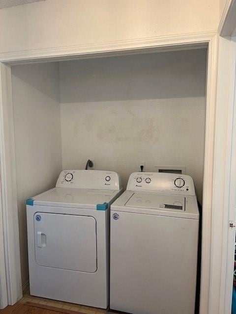 laundry area with washer and dryer