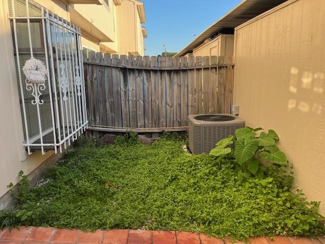 view of yard featuring central AC