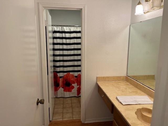 bathroom featuring vanity and walk in shower